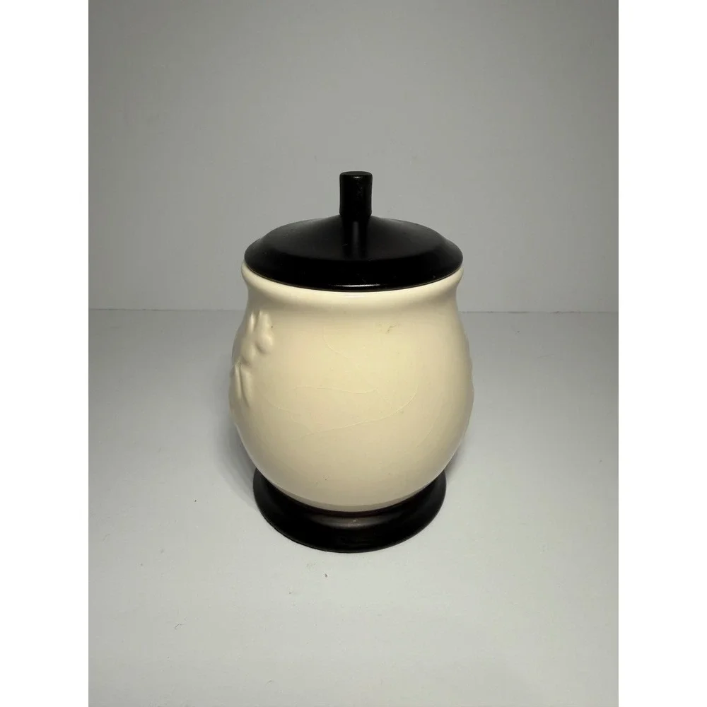 Cream Ceramic Jar with Embossed Floral Vine and Dark Brown Lid and Base